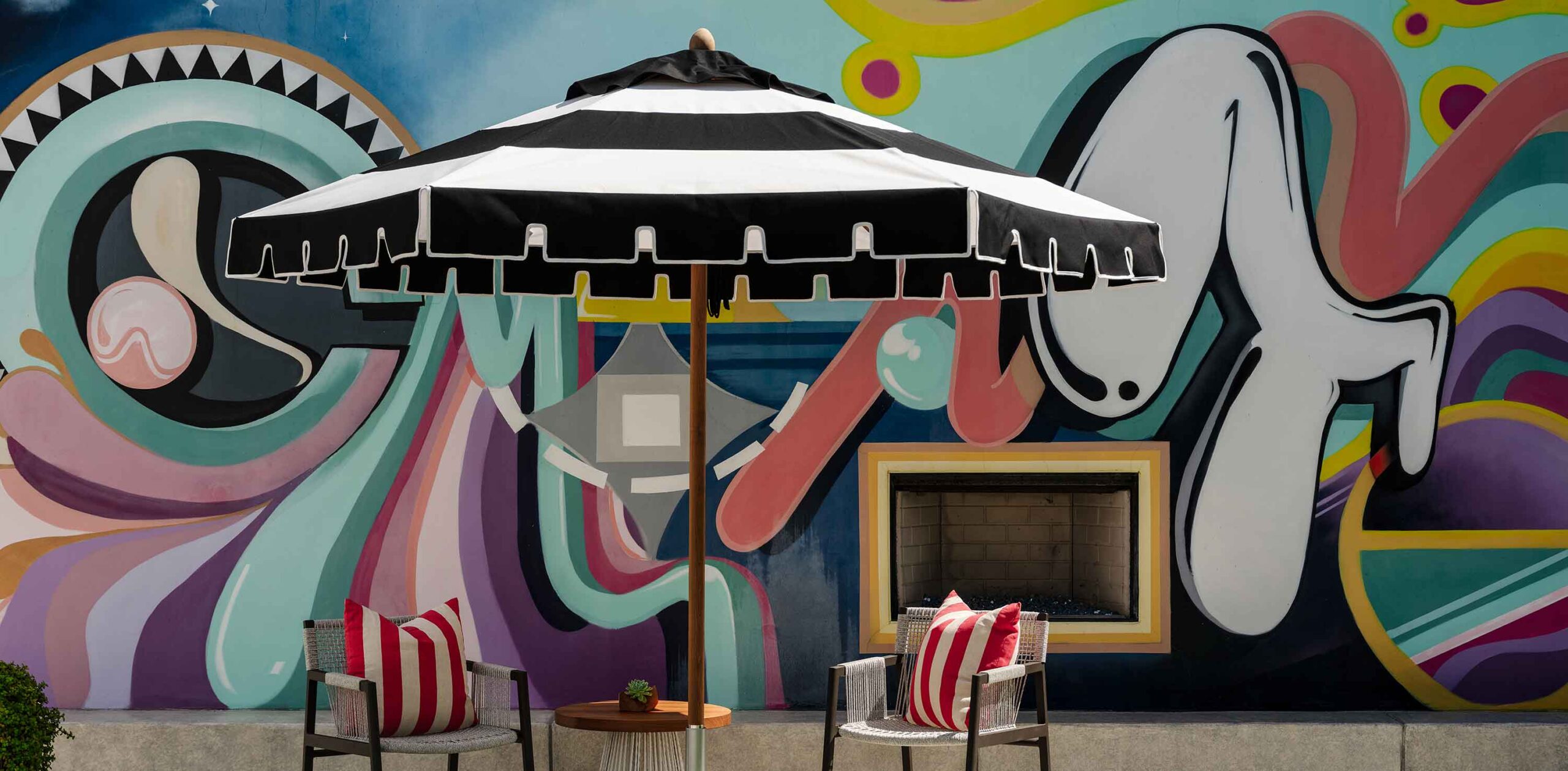 Image of Cirque umbrella and outdoor furniture